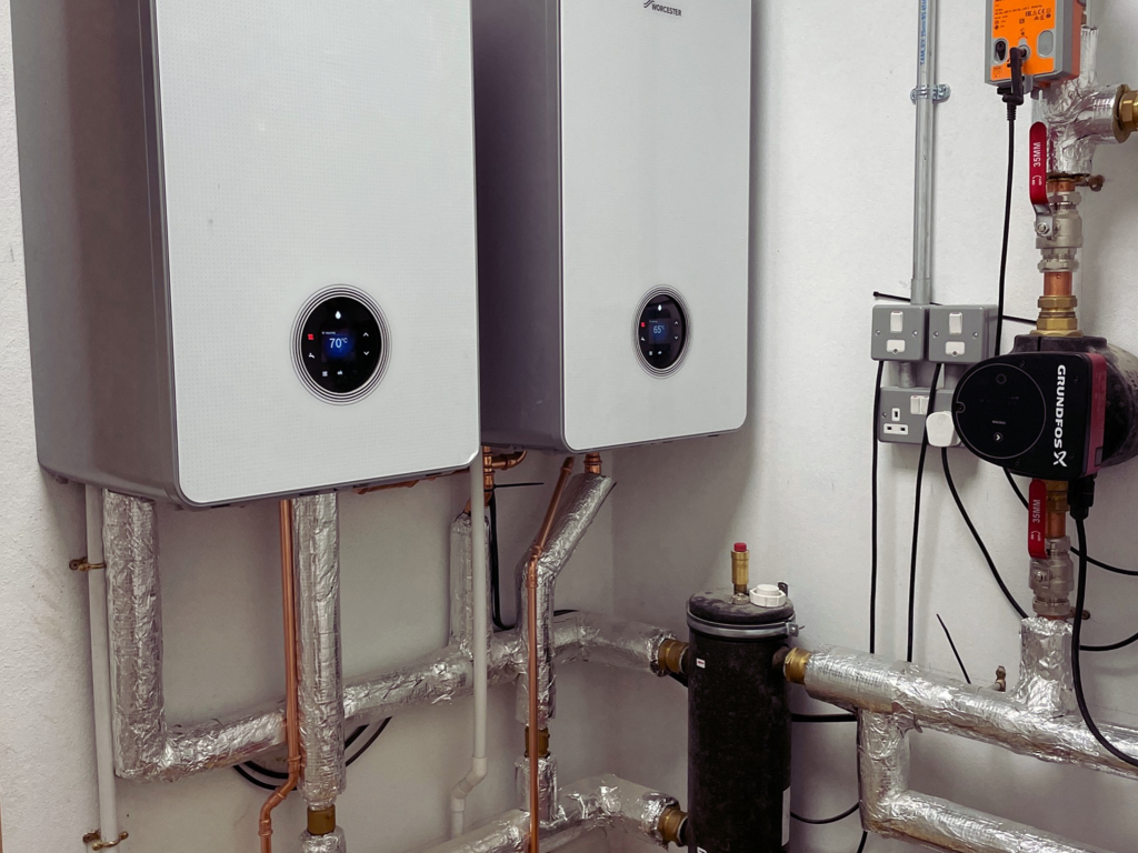 Worcester boilers and heating pipework installed in a plant room
